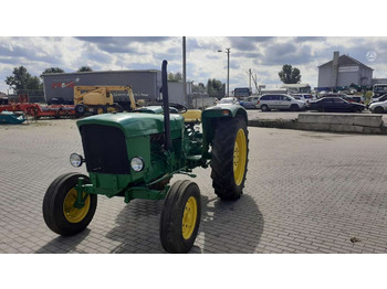 Farm tractor John Deere 710: picture 1