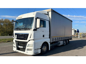 Curtainsider truck MAN TGX