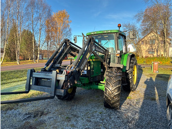 Farm tractor JOHN DEERE 6110