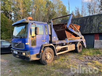 Skip loader truck VOLVO FL6
