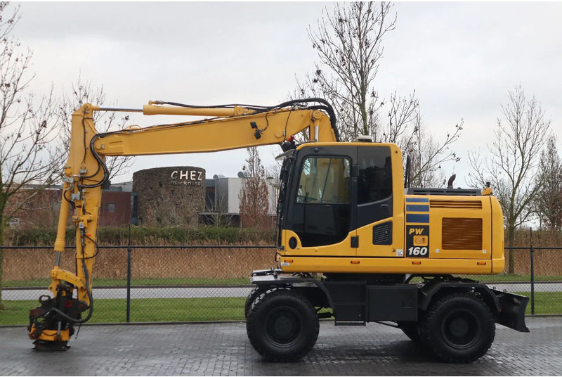 Komatsu PW 160-10 | ROTOTILT | NEW TIRES - Wheel excavator: picture 1 Komatsu PW 160-10 | ROTOTILT | NEW TIRES - Wheel excavator: picture 1