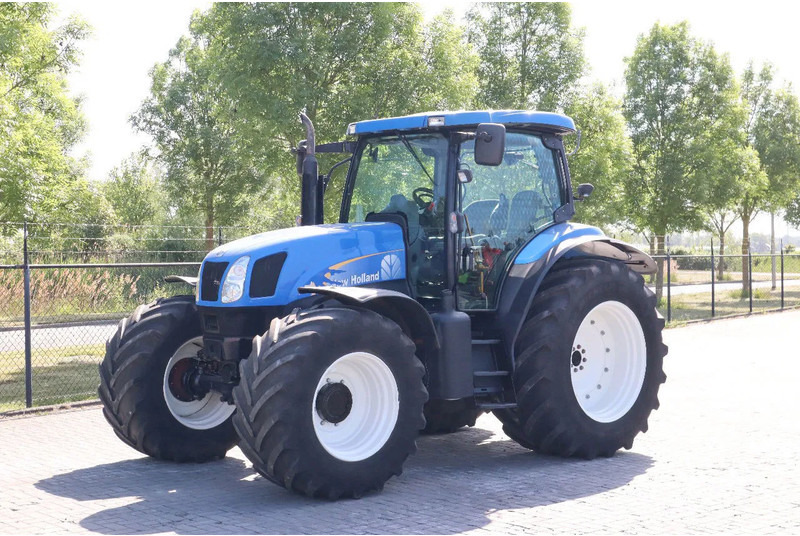 New Holland TS135A | 40 KM/H | 4X4 | SUPERSTEER - Farm tractor: picture 1 New Holland TS135A | 40 KM/H | 4X4 | SUPERSTEER - Farm tractor: picture 1