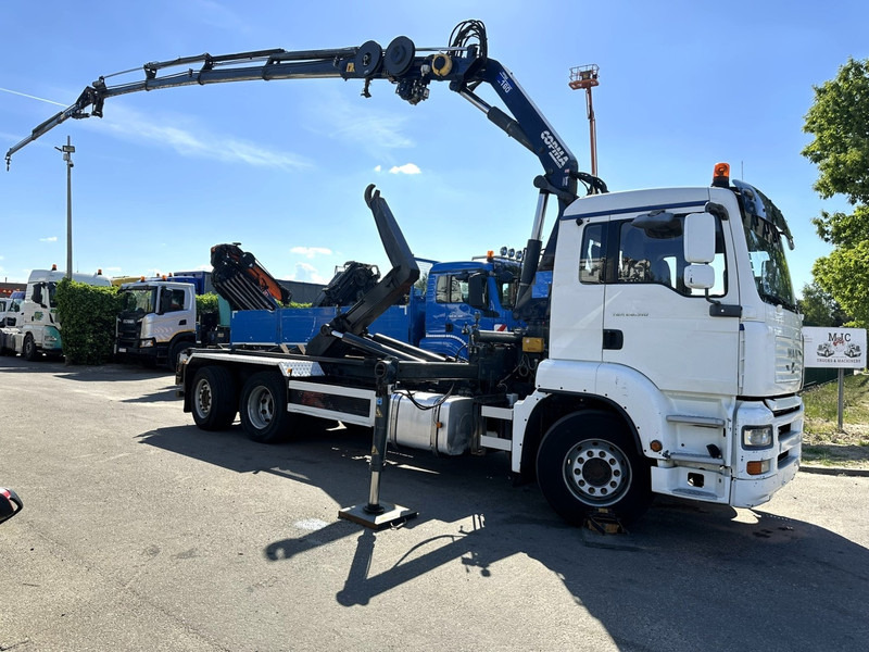MAN TGA 26.310 6X2 HOOKLIFT + CRANE COPMA 160.4 + JIB J2 + WINCH - RADIO - LIFT + STEERING AXLE - EURO 3 - BE - Hook lift truck, Crane truck: picture 1 MAN TGA 26.310 6X2 HOOKLIFT + CRANE COPMA 160.4 + JIB J2 + WINCH - RADIO - LIFT + STEERING AXLE - EURO 3 - BE - Hook lift truck, Crane truck: picture 1