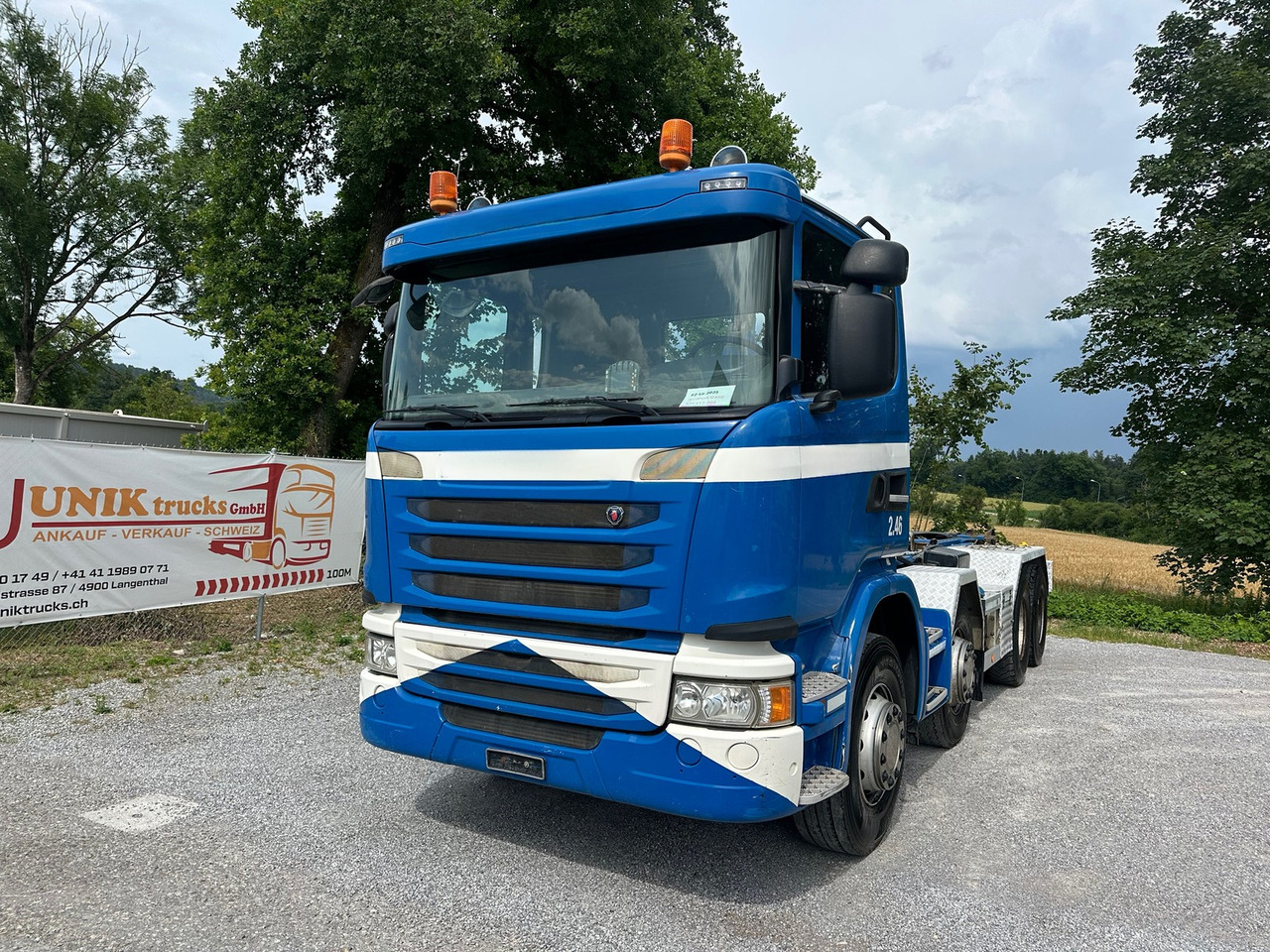 SCANIA G450 8x4 Abrollkipper - Hook lift truck: picture 1 SCANIA G450 8x4 Abrollkipper - Hook lift truck: picture 1