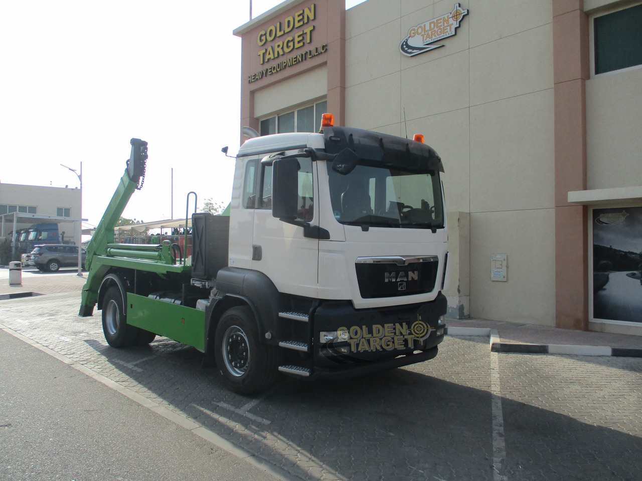 MAN TGS 18.440 4x2 Skip Loader - Skip loader truck: picture 1 MAN TGS 18.440 4x2 Skip Loader - Skip loader truck: picture 1