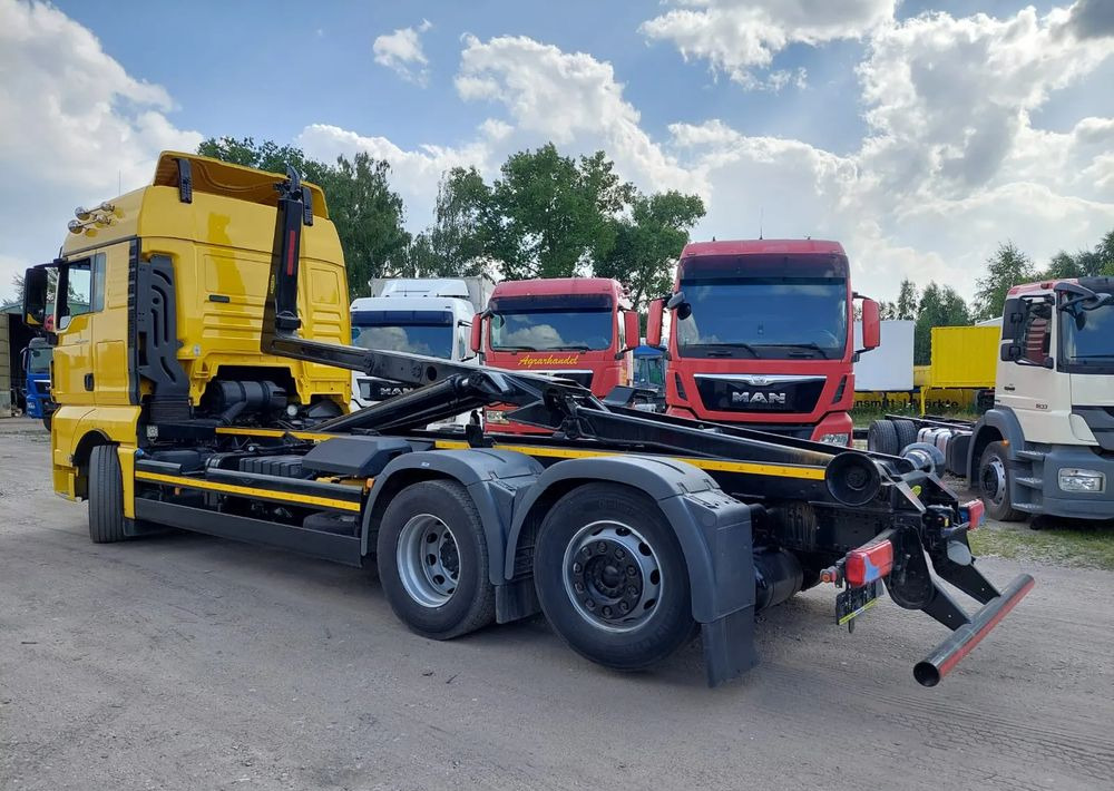 MAN TGX 26-500 Hakowiec oś skrętna - Hook lift truck: picture 1 MAN TGX 26-500 Hakowiec oś skrętna - Hook lift truck: picture 1