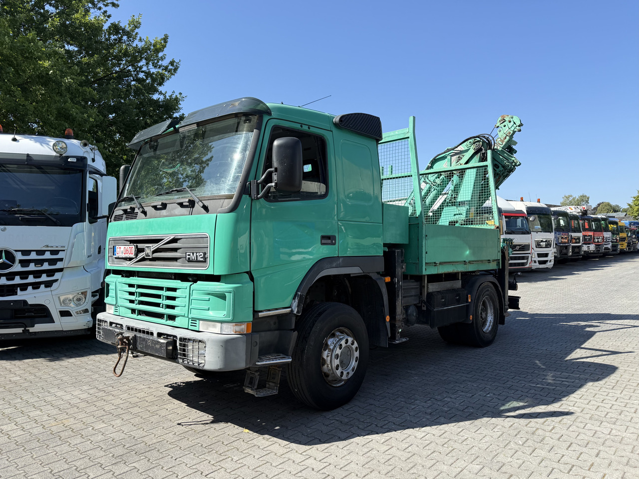 Volvo FM12 420 4X4 Kran MKG 300 bis 24 Meter - Dropside/ Flatbed truck, Crane truck: picture 1 Volvo FM12 420 4X4 Kran MKG 300 bis 24 Meter - Dropside/ Flatbed truck, Crane truck: picture 1