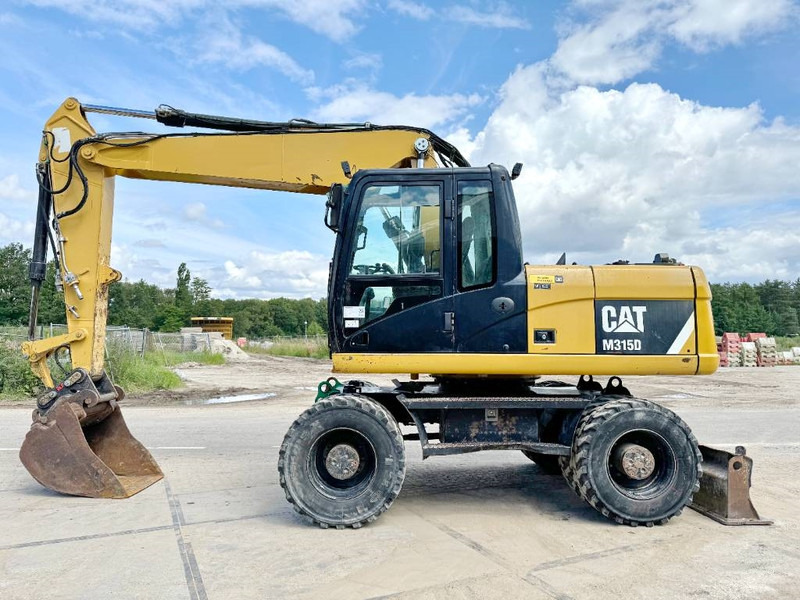 Cat M315D - Triple Boom / Quick Coupler - Wheel excavator: picture 1 Cat M315D - Triple Boom / Quick Coupler - Wheel excavator: picture 1
