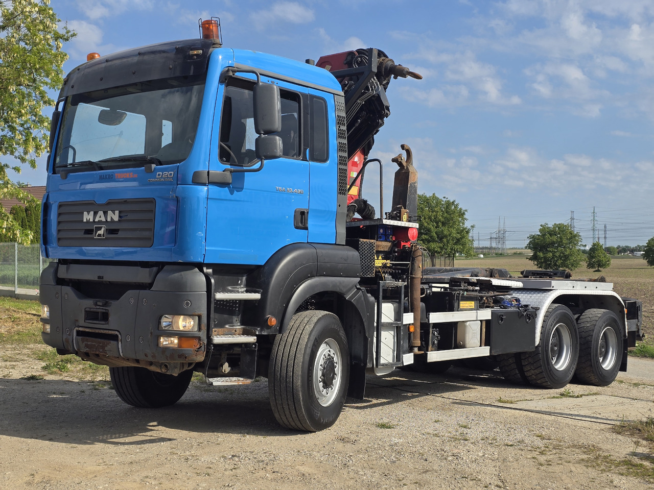 MAN TGA 33.430 6X6 / HMF 1823 K3+REM.CON./ HOOK SYSTEM - Hook lift truck, Crane truck: picture 1 MAN TGA 33.430 6X6 / HMF 1823 K3+REM.CON./ HOOK SYSTEM - Hook lift truck, Crane truck: picture 1