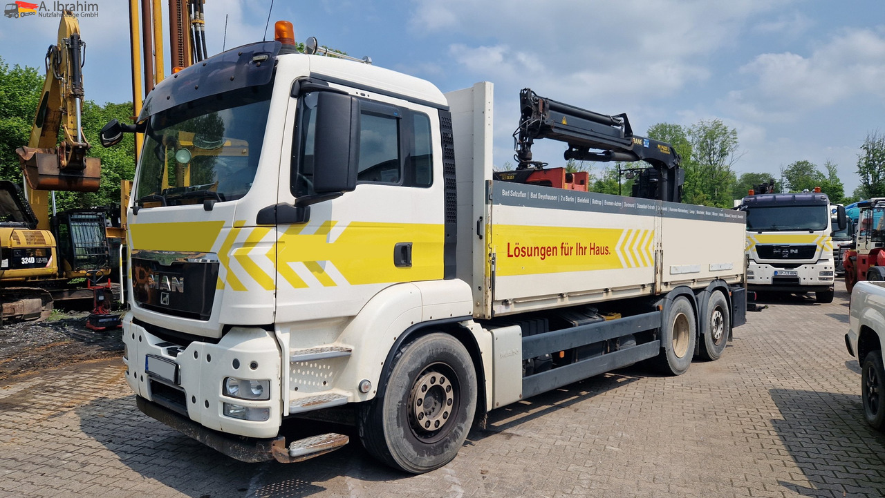 MAN TGS 26.400 PK 15001 Performance Zustand gut, Aufsitzkran - Crane truck, Dropside/ Flatbed truck: picture 1 MAN TGS 26.400 PK 15001 Performance Zustand gut, Aufsitzkran - Crane truck, Dropside/ Flatbed truck: picture 1