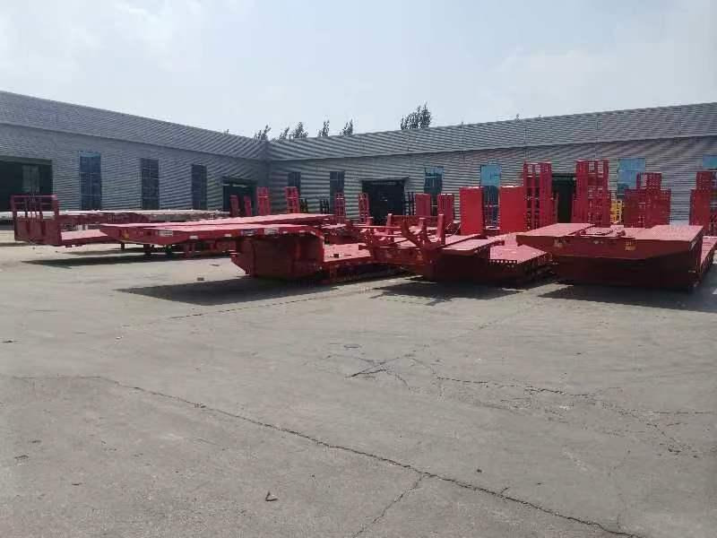ZHICHENG SEMI FLAT BED LOW BED IN VARIOUS AND SIZE ( USED OR NEW CONDITION) - Low loader semi-trailer: picture 1 ZHICHENG SEMI FLAT BED LOW BED IN VARIOUS AND SIZE ( USED OR NEW CONDITION) - Low loader semi-trailer: picture 1