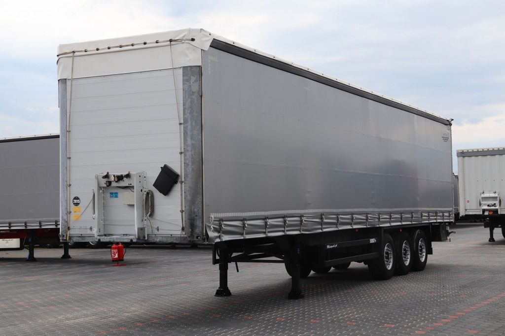 Schmitz Cargobull CURTAINSIDER /STANDARD / CODE XL / LIFTED AXLE - Curtainsider semi-trailer: picture 1 Schmitz Cargobull CURTAINSIDER /STANDARD / CODE XL / LIFTED AXLE - Curtainsider semi-trailer: picture 1