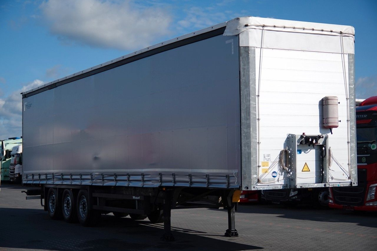 Schmitz Cargobull FIRANKA / STANDARD / 2 OSIE PODNOSZONE / SPROWA - Curtainsider semi-trailer: picture 4 Schmitz Cargobull FIRANKA / STANDARD / 2 OSIE PODNOSZONE / SPROWA - Curtainsider semi-trailer: picture 4