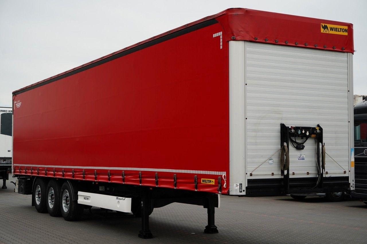 Wielton / FIRANKA STANDARD / MULDA DO STALI - 9 M / OŚ - Curtainsider semi-trailer: picture 1 Wielton / FIRANKA STANDARD / MULDA DO STALI - 9 M / OŚ - Curtainsider semi-trailer: picture 1