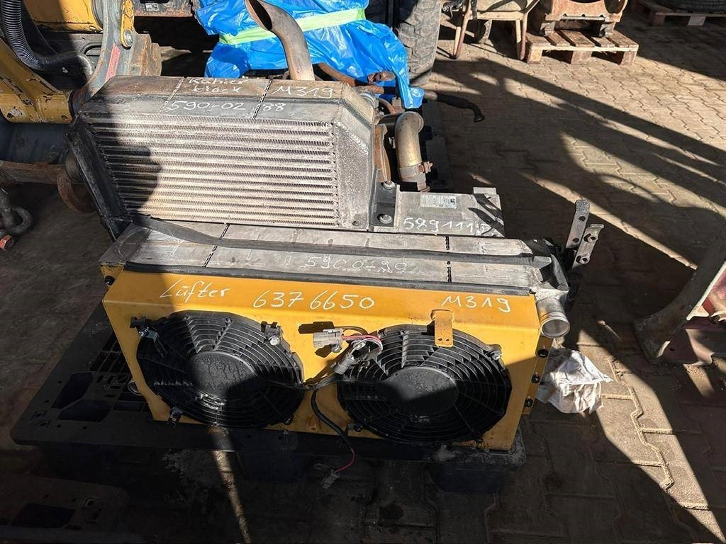 CAT 637-6650 - Sauglüfter ( 2x ) - Radiator for Construction machinery: picture 2 CAT 637-6650 - Sauglüfter ( 2x ) - Radiator for Construction machinery: picture 2