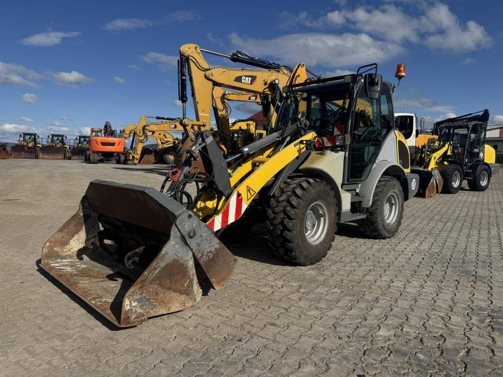 Kramer 8095 mit Klappschaufel und Palettengabeln - Wheel loader: picture 1 Kramer 8095 mit Klappschaufel und Palettengabeln - Wheel loader: picture 1