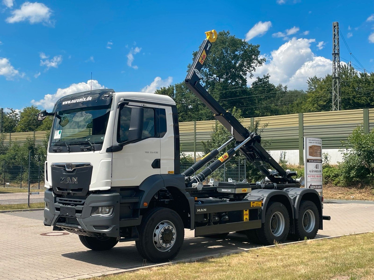 MAN TGS 33.440 6x6 Euro6e Hyva - Hiab MultiLift - Hook lift truck, Crane truck: picture 1 MAN TGS 33.440 6x6 Euro6e Hyva - Hiab MultiLift - Hook lift truck, Crane truck: picture 1