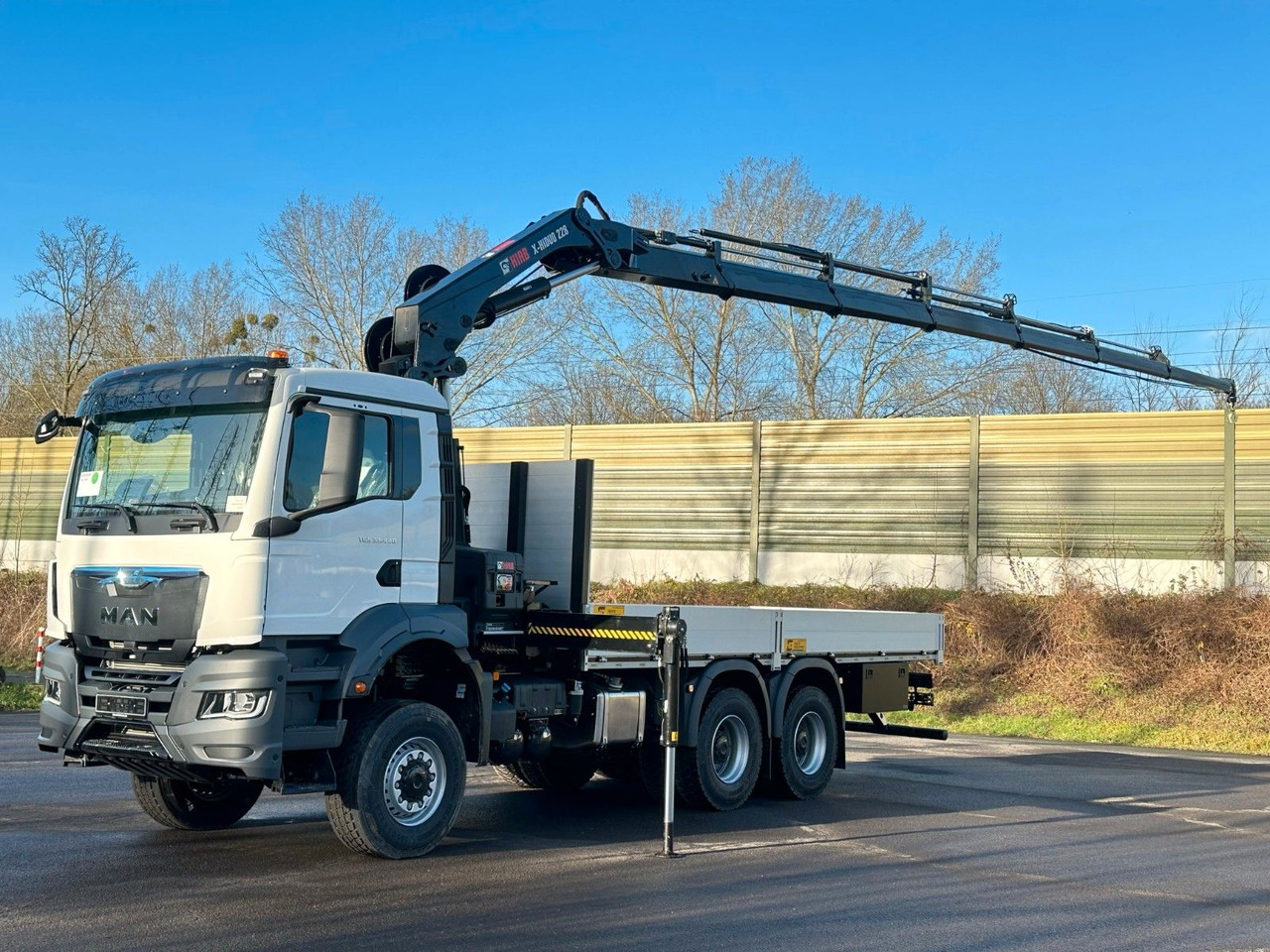 MAN TGS 33.440 6x6 Kran HIAB 228-6 - Dropside/ Flatbed truck, Crane truck: picture 1 MAN TGS 33.440 6x6 Kran HIAB 228-6 - Dropside/ Flatbed truck, Crane truck: picture 1