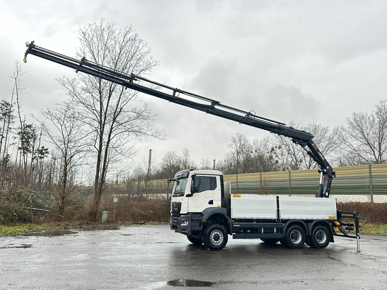 MAN TGS 33.440 6x6 Kran HIAB X-HiPro 302 E 6 - Dropside/ Flatbed truck, Crane truck: picture 1 MAN TGS 33.440 6x6 Kran HIAB X-HiPro 302 E 6 - Dropside/ Flatbed truck, Crane truck: picture 1