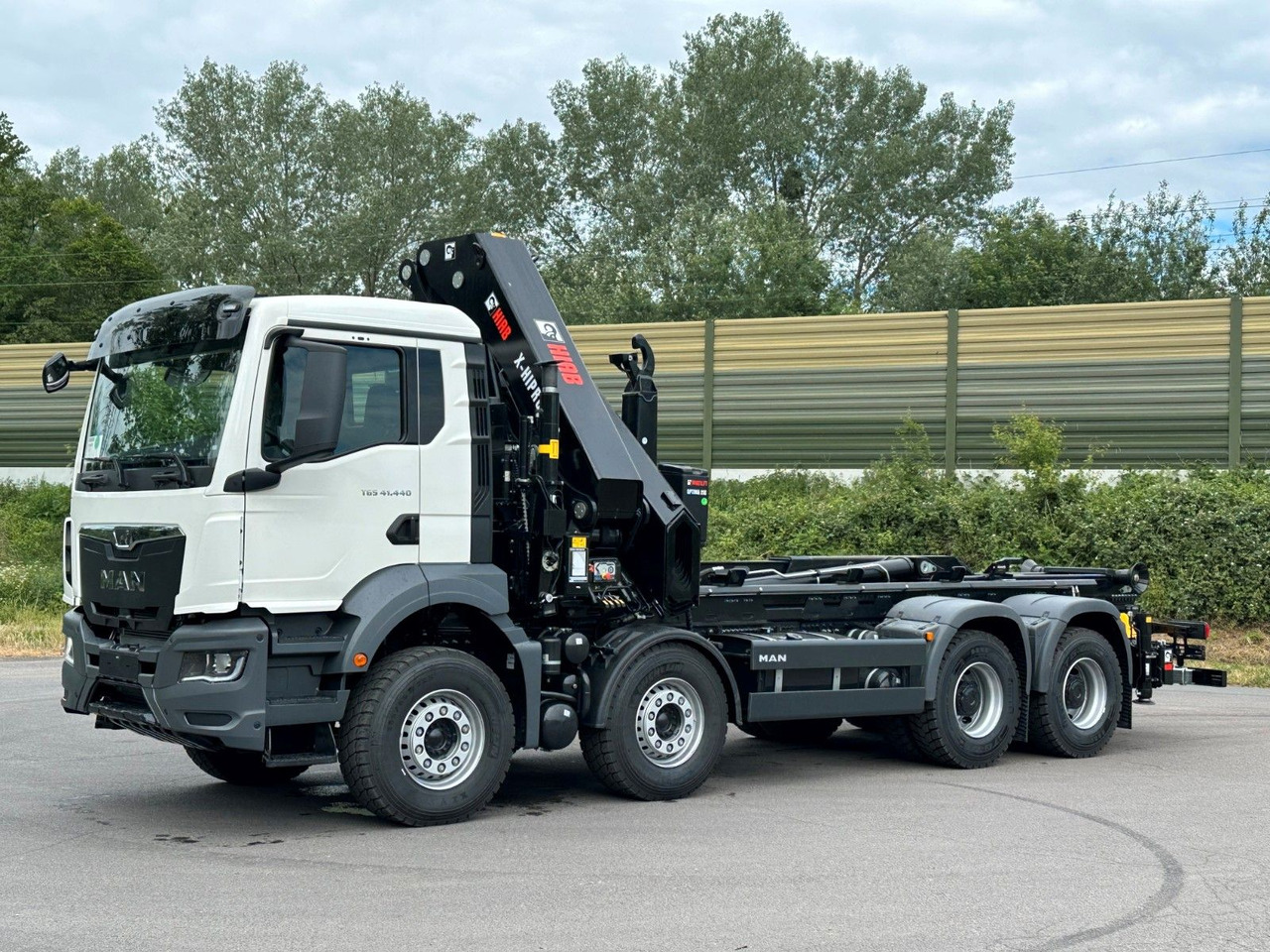MAN TGS 35.520 8x4 Abrollkipper + Kran HIAB 658E6 - Hook lift truck, Crane truck: picture 3 MAN TGS 35.520 8x4 Abrollkipper + Kran HIAB 658E6 - Hook lift truck, Crane truck: picture 3