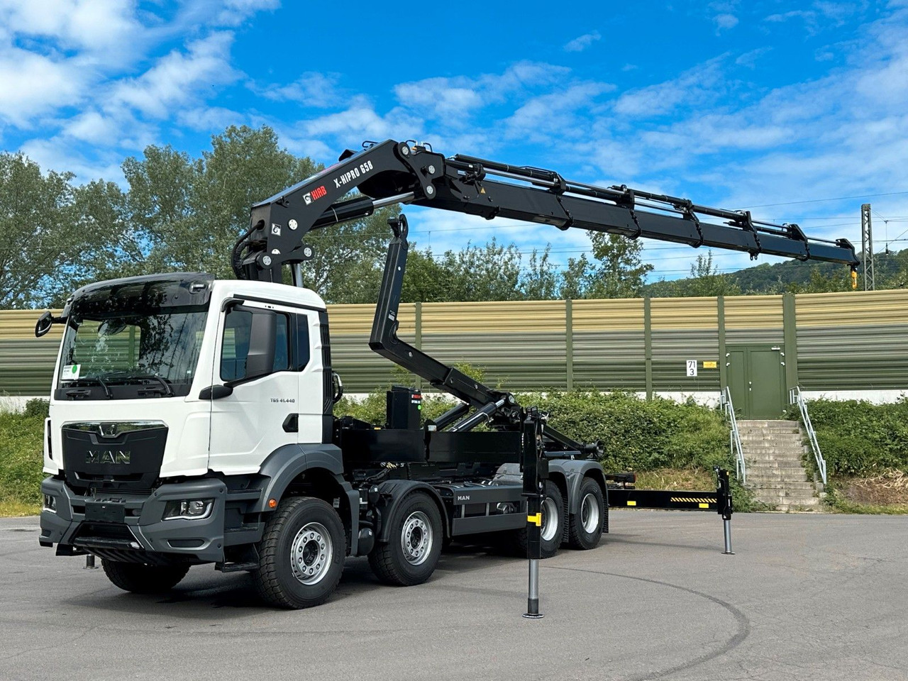 MAN TGS 35.520 8x4 Abrollkipper + Kran HIAB 658E6 - Hook lift truck, Crane truck: picture 1 MAN TGS 35.520 8x4 Abrollkipper + Kran HIAB 658E6 - Hook lift truck, Crane truck: picture 1