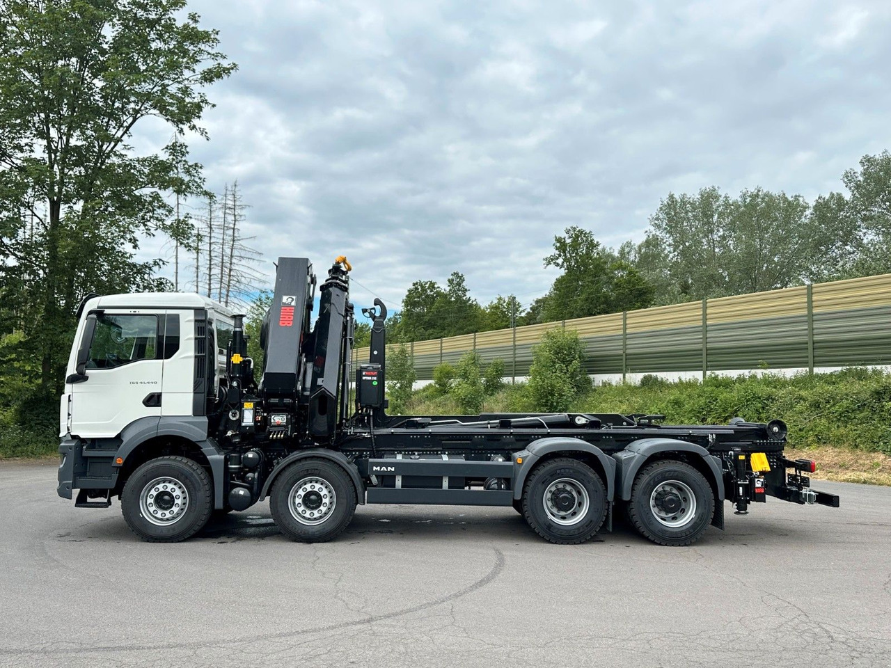MAN TGS 35.520 8x4 Abrollkipper + Kran HIAB 658E6 - Hook lift truck, Crane truck: picture 4 MAN TGS 35.520 8x4 Abrollkipper + Kran HIAB 658E6 - Hook lift truck, Crane truck: picture 4