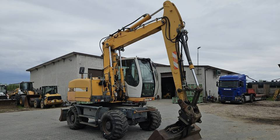 Koparka kołowa Liebherr A314 Litronic 9350 h+ 5 łyżek kołówka - Wheel excavator: picture 4 Koparka kołowa Liebherr A314 Litronic 9350 h+ 5 łyżek kołówka - Wheel excavator: picture 4