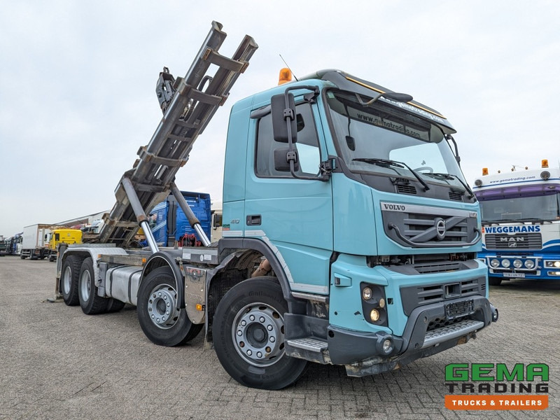 Volvo FMX410 8x4 /4 Daycab Euro5 - Haakarm 25T - CementSilo - RadioGrafisch - Hydr. Steunpoten - NaafReductie - Hook lift truck: picture 2 Volvo FMX410 8x4 /4 Daycab Euro5 - Haakarm 25T - CementSilo - RadioGrafisch - Hydr. Steunpoten - NaafReductie - Hook lift truck: picture 2