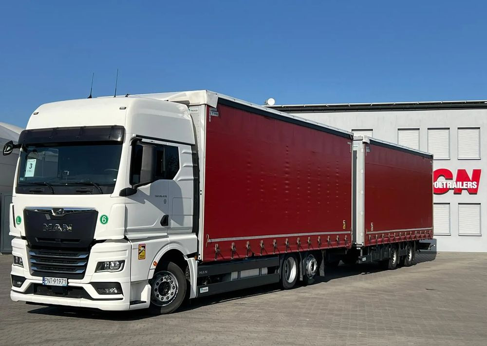 MAN TGX 26.470 z przyczepą Redos - Curtainsider truck, Curtainsider trailer: picture 1 MAN TGX 26.470 z przyczepą Redos - Curtainsider truck, Curtainsider trailer: picture 1
