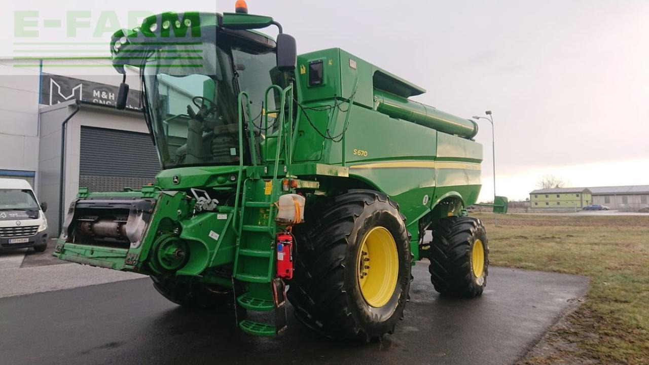 John Deere s670 4wd + macdon fd75 - Combine harvester: picture 1 John Deere s670 4wd + macdon fd75 - Combine harvester: picture 1