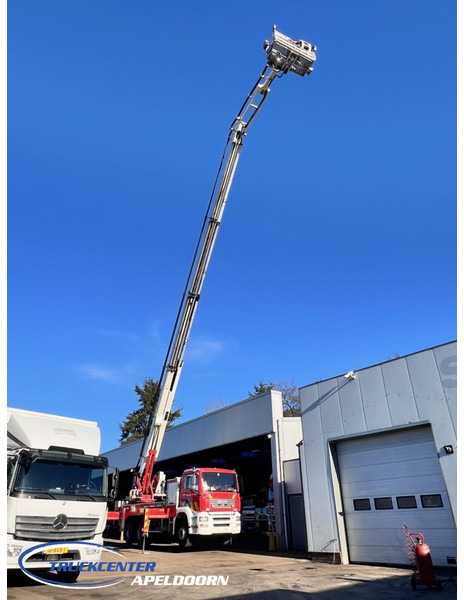 MAN TGA 26.350 Magirus ALP 320L = 32 meter, Waterpump, 6x4, Steel springs - Truck: picture 1 MAN TGA 26.350 Magirus ALP 320L = 32 meter, Waterpump, 6x4, Steel springs - Truck: picture 1