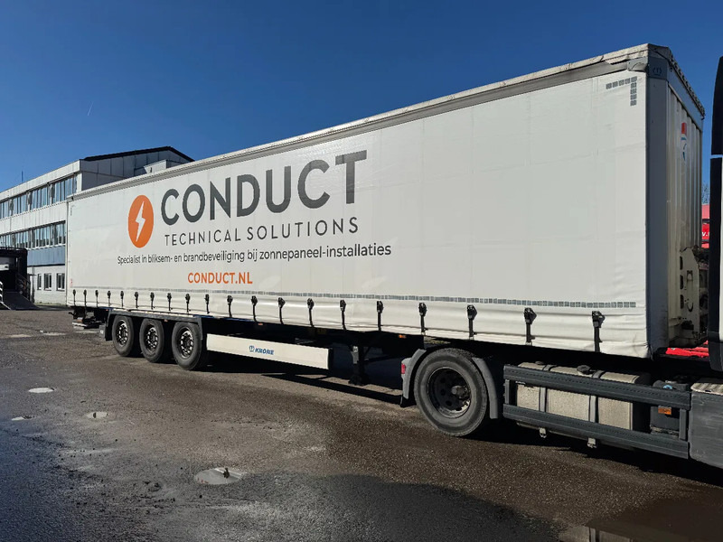 Krone SD DHOLLANDIA 2000 KG 3 AXLE SLIDING ROOF DISC BRAKES - Curtainsider semi-trailer: picture 1 Krone SD DHOLLANDIA 2000 KG 3 AXLE SLIDING ROOF DISC BRAKES - Curtainsider semi-trailer: picture 1
