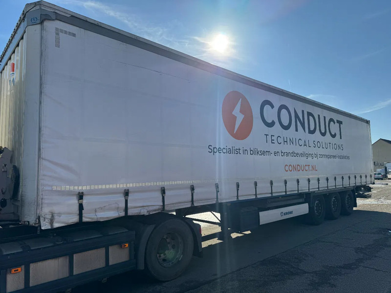 Krone SD DHOLLANDIA 2000 KG 3 AXLE SLIDING ROOF DISC BRAKES - Curtainsider semi-trailer: picture 2 Krone SD DHOLLANDIA 2000 KG 3 AXLE SLIDING ROOF DISC BRAKES - Curtainsider semi-trailer: picture 2