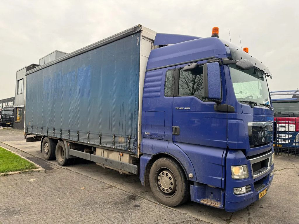 MAN TGX 26.400 6X2 - EURO 4 + LIFT + STEERING AXLE + - Curtainsider truck: picture 3 MAN TGX 26.400 6X2 - EURO 4 + LIFT + STEERING AXLE + - Curtainsider truck: picture 3