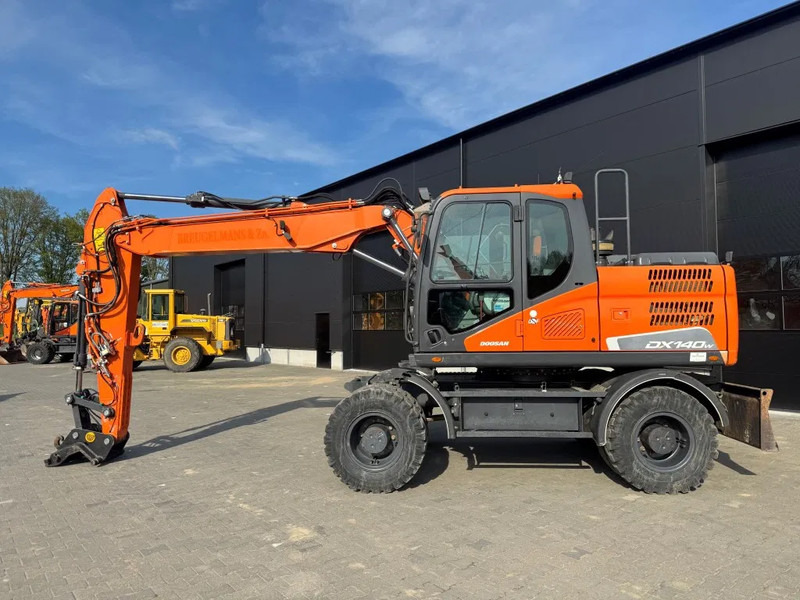 Doosan DX140-5 2018 - Wheel excavator: picture 1 Doosan DX140-5 2018 - Wheel excavator: picture 1