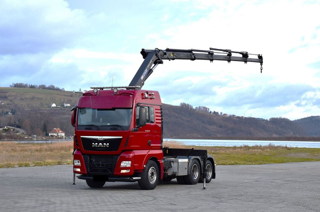 MAN TGX 28.480 Sattelzugmaschine + HMF 2120 K5/FUNK MAN TGX 28.480 Sattelzugmaschine + HMF 2120 K5/FUNK - Tractor unit: picture 2 MAN TGX 28.480 Sattelzugmaschine + HMF 2120 K5/FUNK MAN TGX 28.480 Sattelzugmaschine + HMF 2120 K5/FUNK - Tractor unit: picture 2