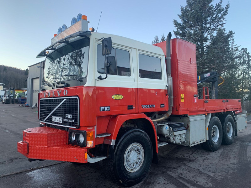 Volvo F10 6x6 with crane - Dropside/ Flatbed truck, Crane truck: picture 1 Volvo F10 6x6 with crane - Dropside/ Flatbed truck, Crane truck: picture 1