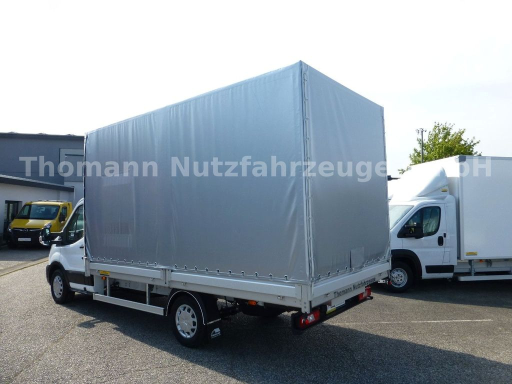 Ford Transit Pritsche Plane 4,25m Klima Temp. DAB Ford Transit Pritsche Plane 4,25m Klima Temp. DAB - Curtain side van: picture 5 Ford Transit Pritsche Plane 4,25m Klima Temp. DAB Ford Transit Pritsche Plane 4,25m Klima Temp. DAB - Curtain side van: picture 5