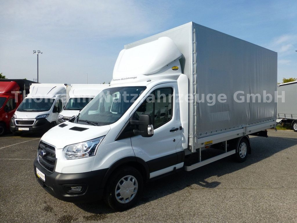 Ford Transit Pritsche Plane 4,25m Klima Temp. DAB Ford Transit Pritsche Plane 4,25m Klima Temp. DAB - Curtain side van: picture 2 Ford Transit Pritsche Plane 4,25m Klima Temp. DAB Ford Transit Pritsche Plane 4,25m Klima Temp. DAB - Curtain side van: picture 2
