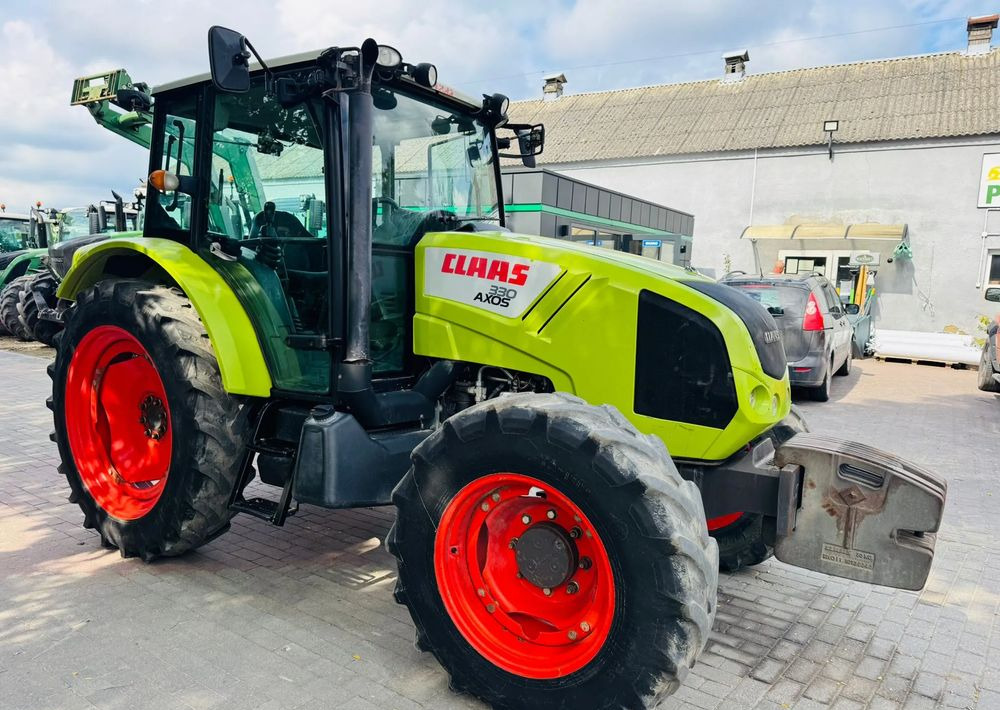 Farm tractor Claas Axos 330: picture 9