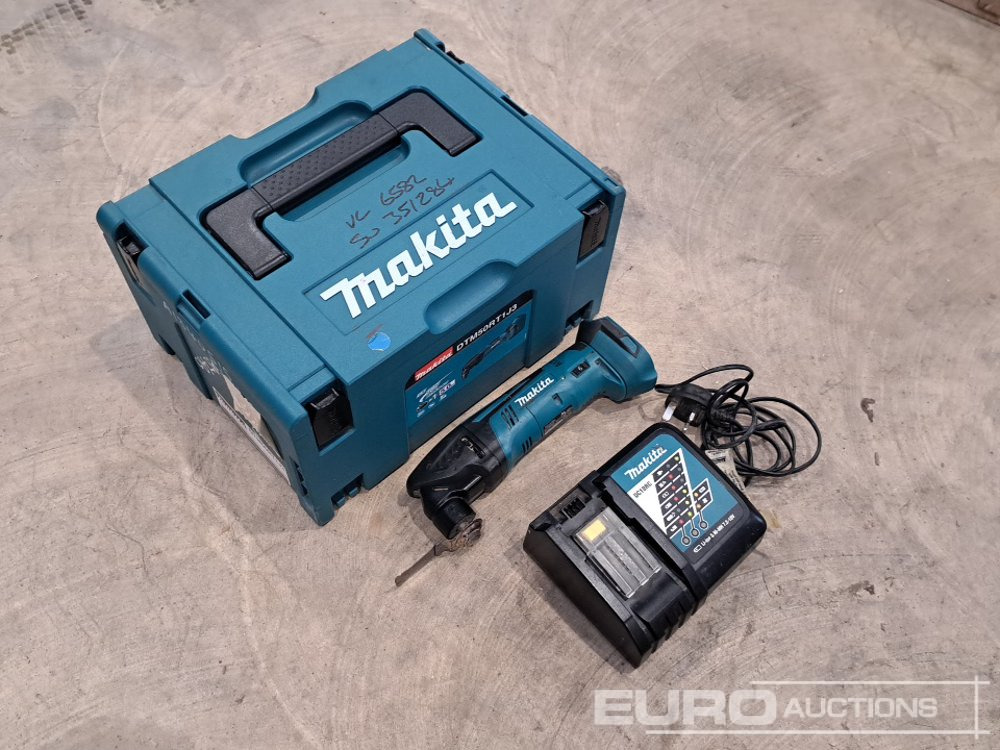 Makita DTM50 18 Volt Multi Tool (Body, Charger, Case) - Construction equipment: picture 2 Makita DTM50 18 Volt Multi Tool (Body, Charger, Case) - Construction equipment: picture 2